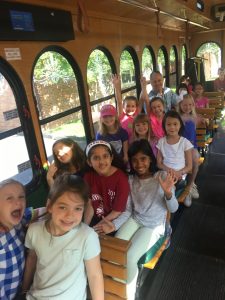 Students aboard a trolley bus