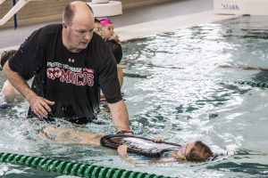JK Students learn to swim in the pool