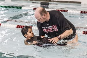 JK Students learn to swim in the pool